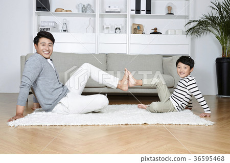 Young father and son take a rest in the living room 125 Young father and son take a rest in the living room 125 36595468