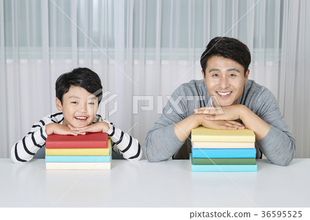 Young father's good teacher for son - playing guitar, reading storybook, etc. 261 Young father's good teacher for son - playing guitar, reading storybook, etc. 261 36595525