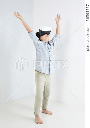 Young father and son playing with a VR game. 319 Young father and son playing with a VR game. 319 36595557