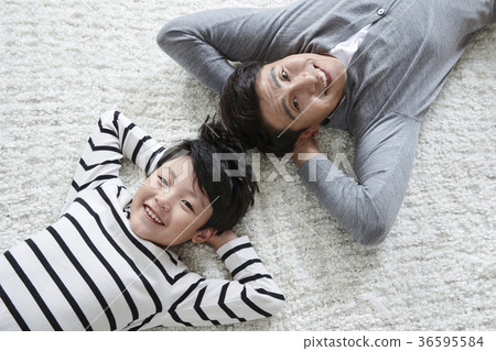 Young father and son take a rest in the living room 165 Young father and son take a rest in the living room 165 36595584