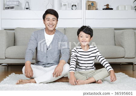Young father and son take a rest in the living room 168 Young father and son take a rest in the living room 168 36595601