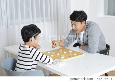 Young father's good teacher for son - playing guitar, reading storybook, etc. 303 Young father's good teacher for son - playing guitar, reading storybook, etc. 303 36595603