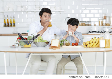 Young father with son preparing dishes, and dish washing together. 354 Young father with son preparing dishes, and dish washing together. 354 36595637