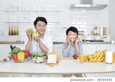 Young father with son preparing dishes, and dish washing together. 362 Young father with son preparing dishes, and dish washing together. 362 36595644