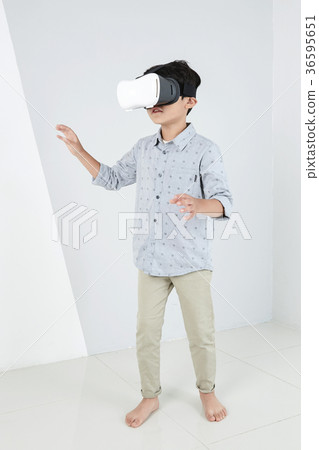 Young father and son playing with a VR game. 314 Young father and son playing with a VR game. 314 36595651