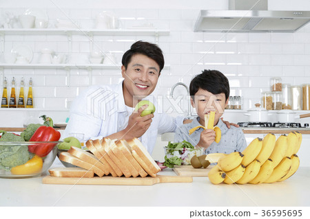 Young father with son preparing dishes, and dish washing together. 341 36595695