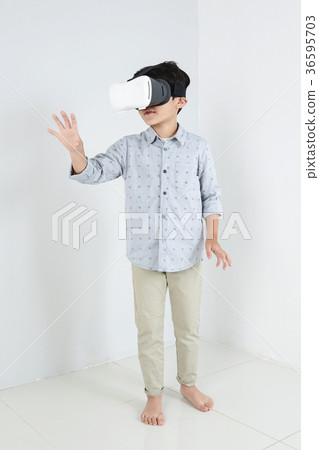 Young father and son playing with a VR game. 312 Young father and son playing with a VR game. 312 36595703