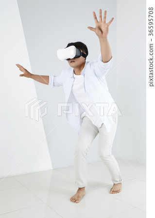 Young father and son playing with a VR game. 324 Young father and son playing with a VR game. 324 36595708