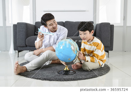 Young father's good teacher for son - playing guitar, reading storybook, etc. 250 Young father's good teacher for son - playing guitar, reading storybook, etc. 250 36595724