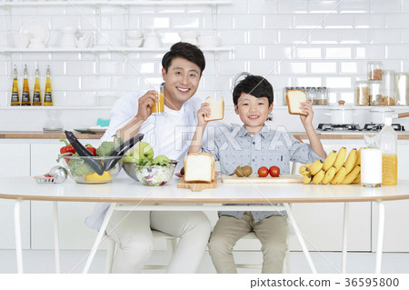 Young father with son preparing dishes, and dish washing together. 363 Young father with son preparing dishes, and dish washing together. 363 36595800