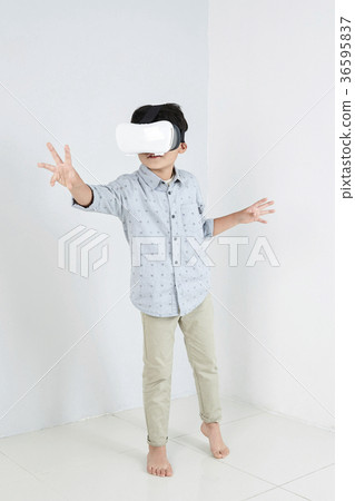 Young father and son playing with a VR game. 317 Young father and son playing with a VR game. 317 36595837