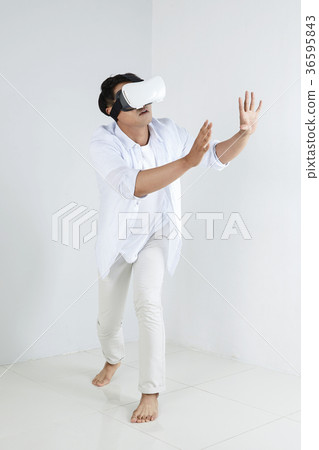 Young father and son playing with a VR game. 322 Young father and son playing with a VR game. 322 36595843