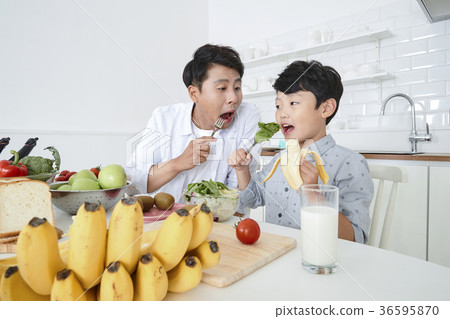 Young father with son preparing dishes, and dish washing together. 343 Young father with son preparing dishes, and dish washing together. 343 36595870