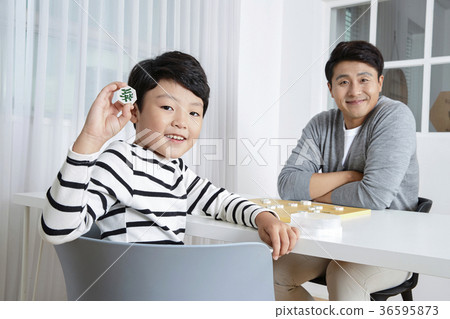 Young father's good teacher for son - playing guitar, reading storybook, etc. 307 Young father's good teacher for son - playing guitar, reading storybook, etc. 307 36595873
