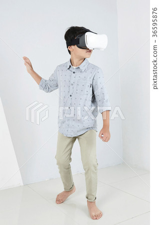Young father and son playing with a VR game. 313 Young father and son playing with a VR game. 313 36595876