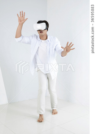 Young father and son playing with a VR game. 320 Young father and son playing with a VR game. 320 36595883