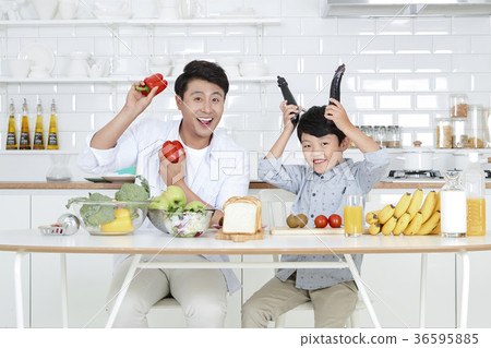 Young father with son preparing dishes, and dish washing together. 347 Young father with son preparing dishes, and dish washing together. 347 36595885