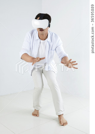 Young father and son playing with a VR game. 321 Young father and son playing with a VR game. 321 36595889