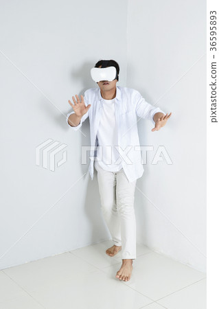 Young father and son playing with a VR game. 325 Young father and son playing with a VR game. 325 36595893