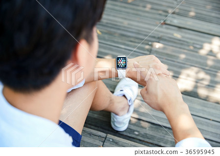 Young guy take a relax in park, sit on green grass and walking in around. 016 Young guy take a relax in park, sit on green grass and walking in around. 016 36595945