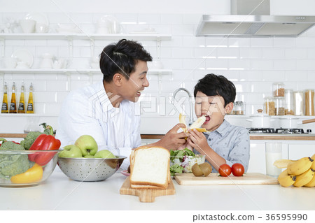 Young father with son preparing dishes, and dish washing together. 360 Young father with son preparing dishes, and dish washing together. 360 36595990
