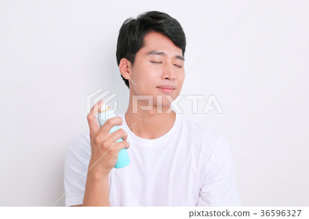 A mugshot of Young guy.- shaving, put lotion, hair dryer, etc. 221 A mugshot of Young guy.- shaving, put lotion, hair dryer, etc. 221 36596327