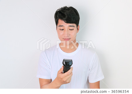 A mugshot of Young guy.- shaving, put lotion, hair dryer, etc. 239 A mugshot of Young guy.- shaving, put lotion, hair dryer, etc. 239 36596354