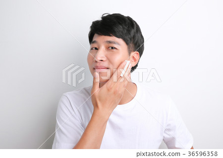 A mugshot of Young guy.- shaving, put lotion, hair dryer, etc. 243 A mugshot of Young guy.- shaving, put lotion, hair dryer, etc. 243 36596358