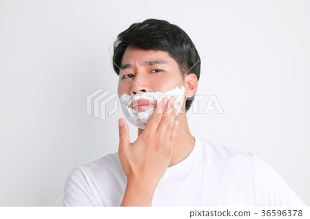 A mugshot of Young guy.- shaving, put lotion, hair dryer, etc. 211 A mugshot of Young guy.- shaving, put lotion, hair dryer, etc. 211 36596378