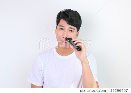 A mugshot of Young guy.- shaving, put lotion, hair dryer, etc. 209 A mugshot of Young guy.- shaving, put lotion, hair dryer, etc. 209 36596407