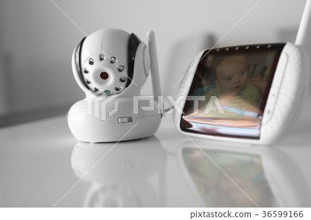 The closeup baby monitor for security of the baby The closeup baby monitor for security of the baby 36599166