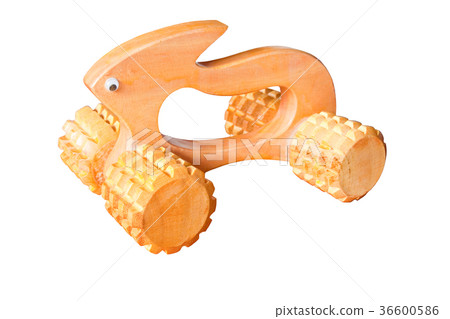 Wooden massage tool isolated on white background. Wooden massage tool isolated on white background. 36600586