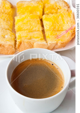 Breakfast with coffee and bread on the table Breakfast with coffee and bread on the table 36600591