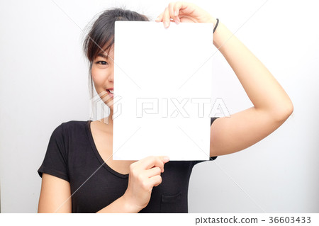 Asian women hold white paper 36603433