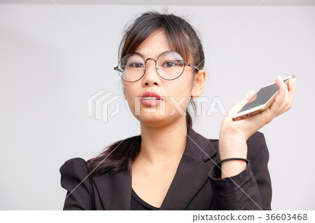 Business asian glasses women use cellphone 36603468
