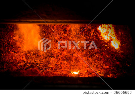 Hot steel pouring in steel plant 36606693