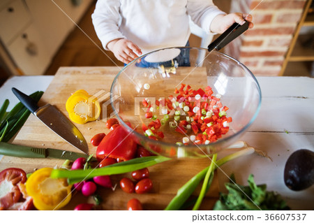 Toddler boy in the kitchen. Toddler boy in the kitchen. 36607537