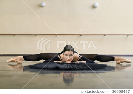 Ballerina posing in dance hall 36608457