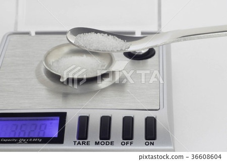 White powder and spatula and electronic scale White powder and spatula and electronic scale 36608604