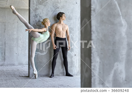 Ballet dancers posing at unfinished building 36609248