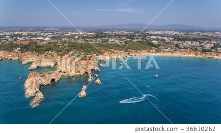 Aerial. Rocky beach shores of Portimao. Algarve 36610262