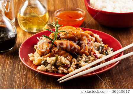Fried chicken with rice and sweet and sour sauce Fried chicken with rice and sweet and sour sauce 36610617