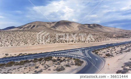highway roads crossing in arid, desert mountains 36611444