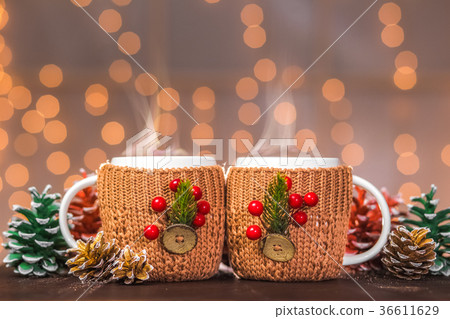 Two white steaming cups Two white steaming cups 36611629