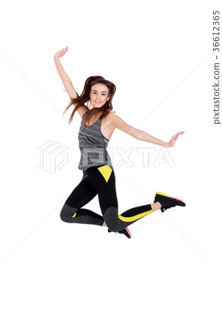 fit woman in sportswear jumping fit woman in sportswear jumping 36612365