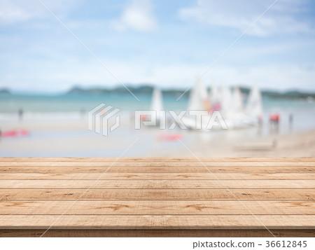 Empty wooden table on blurred background Empty wooden table on blurred background 36612845
