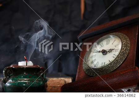 Extinguished Candle Near Clock Extinguished Candle Near Clock 36614862