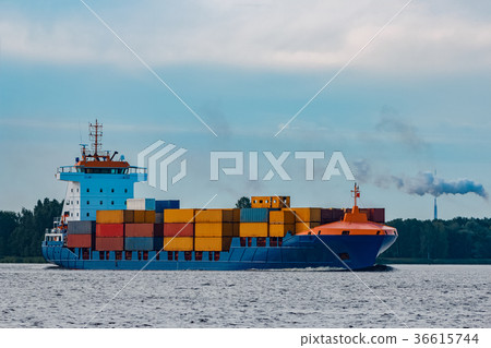 Blue container ship underway Blue container ship underway 36615744