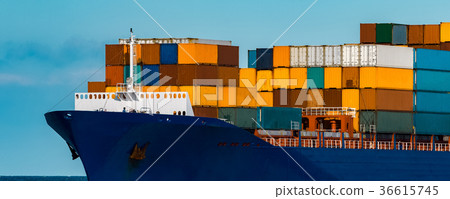 Blue container ship underway Blue container ship underway 36615745