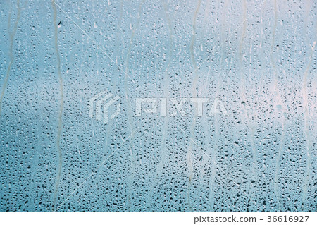 Drops Of Water Or Rain On Wet Glass Background Drops Of Water Or Rain On Wet Glass Background 36616927
